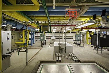 Main Attic Mechanical Room after restoration of the Renwick Gallery showing color coded piping jacketing